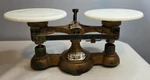 Vintage Ohaus Cast Iron Balance Scale With Milk Glass Trays. Fixed Price $50.00.
