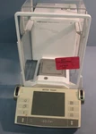 Mettler Toledo AX205 Deltarange Analytical Balance Scale D= .01 Mg Max 81G/220G. Fixed Price $599.99.