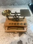Antique Balance Scale With Brass Weights And Wooden Base. Fixed Price $40.00.