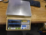 And Model: FC-5000 Digital Counting Scale. Cap. 5000G X 0.5G, With Ac Adapter.. Fixed Price $724.99.