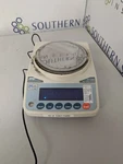 And FX1200I Analytical Balance. Fixed Price $75.00.