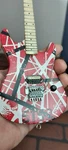 Eddie Van Halen- Red/white "5150" 1:4 Scale Replica Guitar Licensed. Fixed Price $44.95.