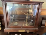 Troemner Balance Co. Antique Apothecary Beam Scale In Wooden Glass Case. Fixed Price $400.00.