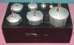 Antique 8 Pc Apothecary Scale Weights In Wood Holder Grams - 1000. Fixed Price $27.50.