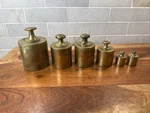 Vintage Lot Of 6 Brass Scale Weights (1)-2KILOS (2)-1KILO (1)-500G (2)-100G. Fixed Price $70.00.