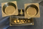 Antique Pelouze Rexo No. 8 Scale, Avoirdupois, Metric With Brass Weights. Fixed Price $21.00.