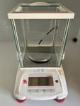 Ohaus Pioneer Model PX124/E, Analytical Electronic Balance, 120 G 0.0001. Fixed Price $1250.00.