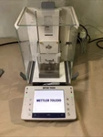 Mettler Toledo XPE56 Analytical Balance 52G Powers On. Missing Front Glass. Fixed Price $5000.00.