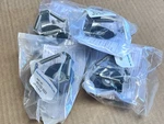 Lot Of 4 New Brunswick 125ML Erlenmeyer Flask Clamps M1190-9001. Fixed Price $54.00.